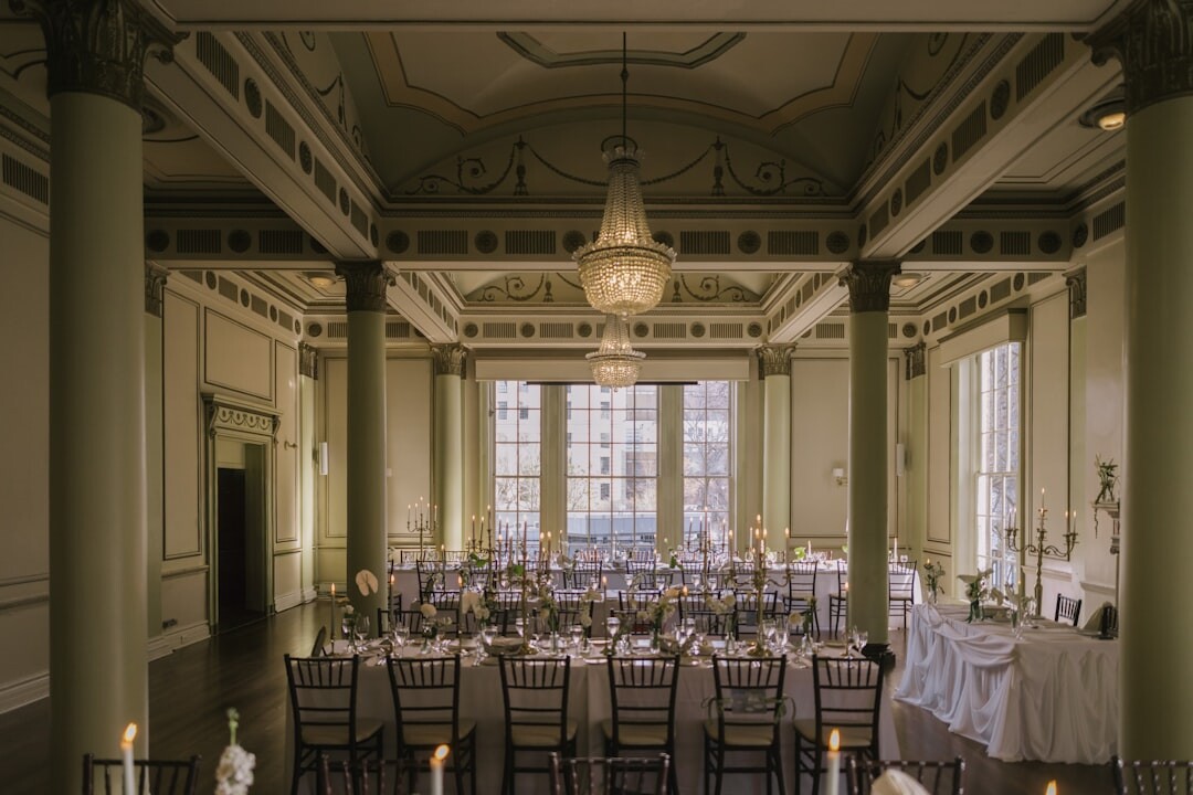 Elegant gala hall decorated with string lights and chandeliers